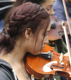 student playing violin